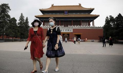 Китай отчита спад на новозаразените с коронавирус - 1