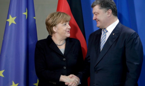 Порошенко и Меркел искат санкциите срещу Русия да останат в сила - 1