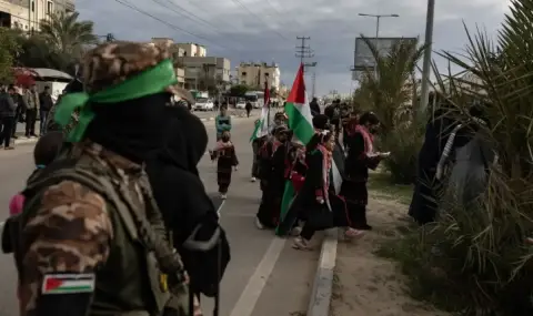 Red Cross vehicles await three Israeli hostages at Hamas-agreed location  - 1