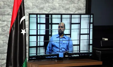 Thousands gather in Libya for funeral of Muammar Gaddafi's son  - 1