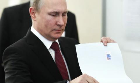 Путин гласува за президент на Русия (СНИМКИ) - 1