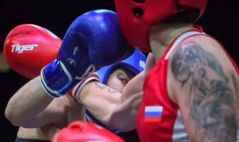 Руска секси боксьорка пуши вейп с орангутан (ВИДЕО) - 1