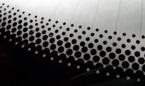 The Unknown Function of the Small Black Dots on the Car Windshield  - 1