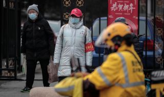 Китай изолира няколко квартала заради двама заразени
