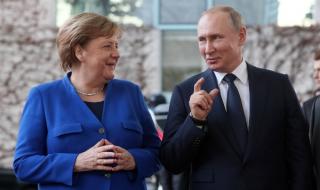 Путин разговаря с Меркел