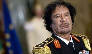 И Интерпол погна Кадафи и сина му Сейф