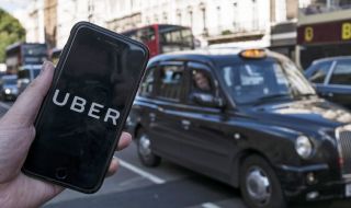 Uber осигурява минимални заплати