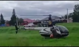Мъж кацна с хеликоптер пред селски магазин в Русия, напазарува и отлетя ВИДЕО