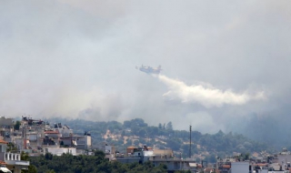 Първа жертва на пожарите в Гърция