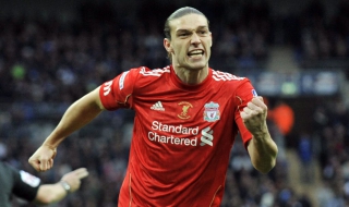 Ливърпул маха Керъл, иска Уолкот