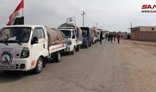 Иракски конвой с хуманитарна помощ пристигна на КПП Ал-Букамал, Дейр Ез Зор