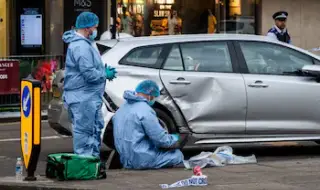 Car runs over pedestrians in London, one arrested 