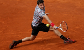 Григор Димитров започна с победа в Мадрид след отказ на съперника