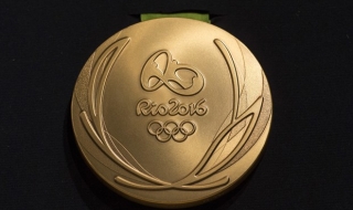 Колко злато има в златните медали на Болт и Фелпс?
