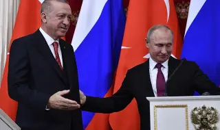 Vladimir Putin and Recep Erdogan - caressing, but not hugging 
