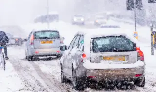 Britain hit by heavy snow, flooding disrupting transport links 