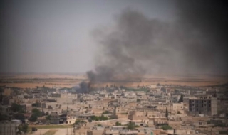 Журналист видя отблизо боевете в град Манбидж (ВИДЕО)