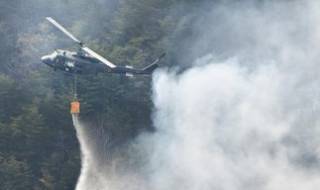 Трети ден се борят с пожар около Фукушима