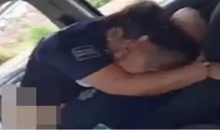 Police officers indulged in passionate sex in a patrol car 