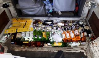 Хванаха 66 бутилки твърд алкохол в тайник