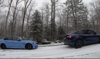Tesla се притече на помощ на закъсало BMW M3 в снега (ВИДЕО)