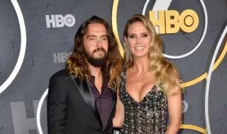 Хайди Клум скри формите си на плажа с хавлия с лицето на съпруга ѝ Том Каулиц (СНИМКИ)