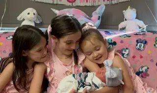 A woman gave birth to her four children on the same date 