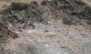 Телата от масовите гробове край Донецк са вече близо 400