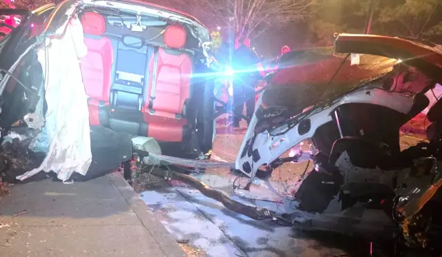 Porsche Cayenne Coupe splits in half in crash 