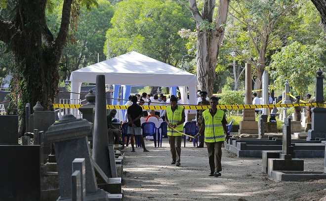 Изкопаха тялото на убит журналист в Шри Ланка