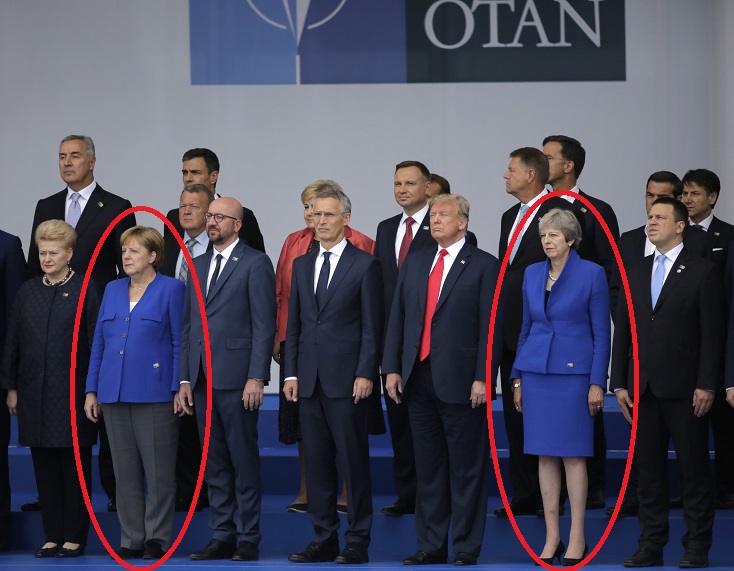 Тежък сблъсък между Меркел и Мей по време на срещата на НАТО (СНИМКИ)
