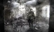 Снимка Руска атака порази два многоетажни блока в Киев